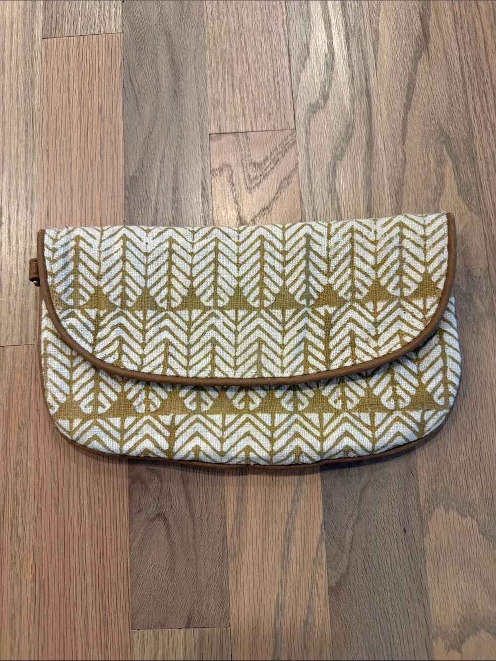 Patterned Mustard Fold-Over Clutch with White Arrow Motif